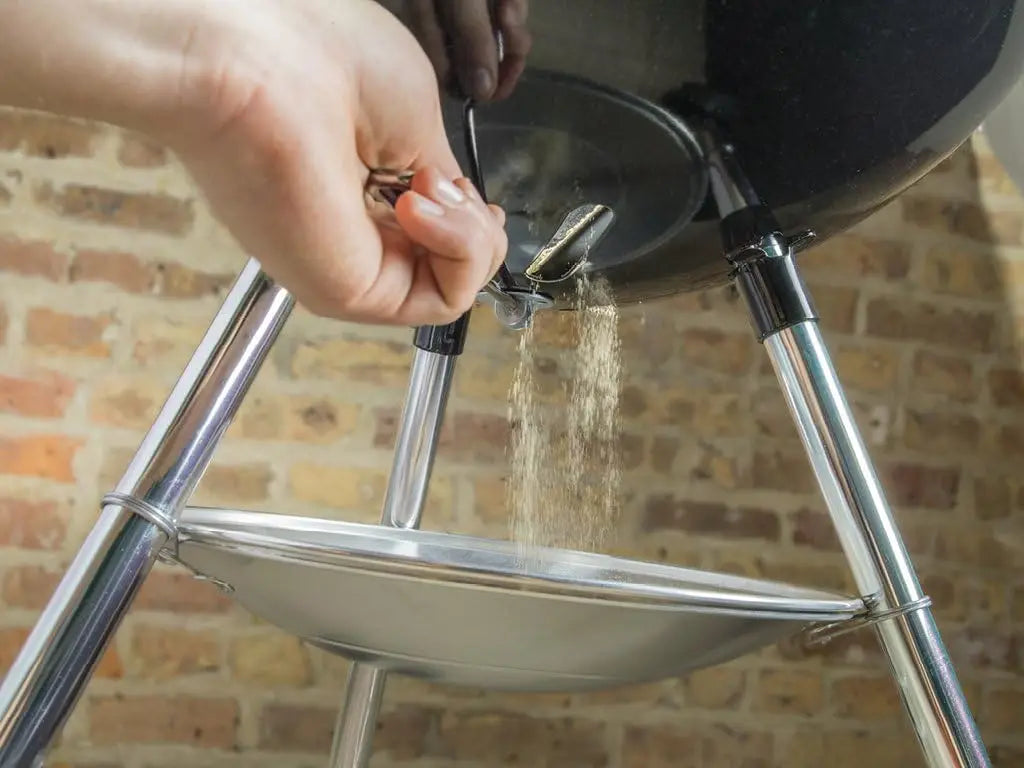 Charcoal Grill With One Touch Cleaning System And Temperature Dampers