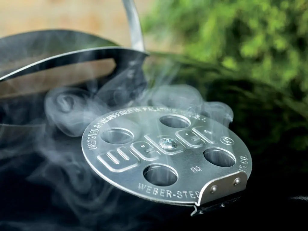Charcoal Grill With One Touch Cleaning System And Temperature Dampers